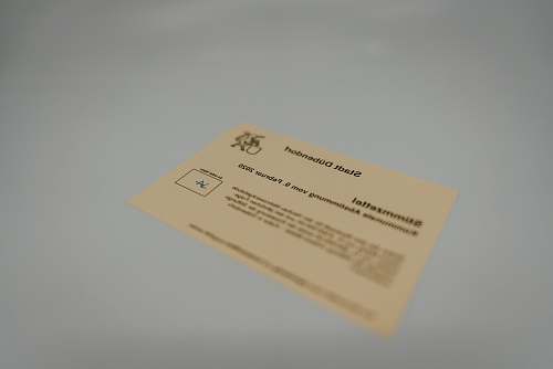 business card brown card on white table paper